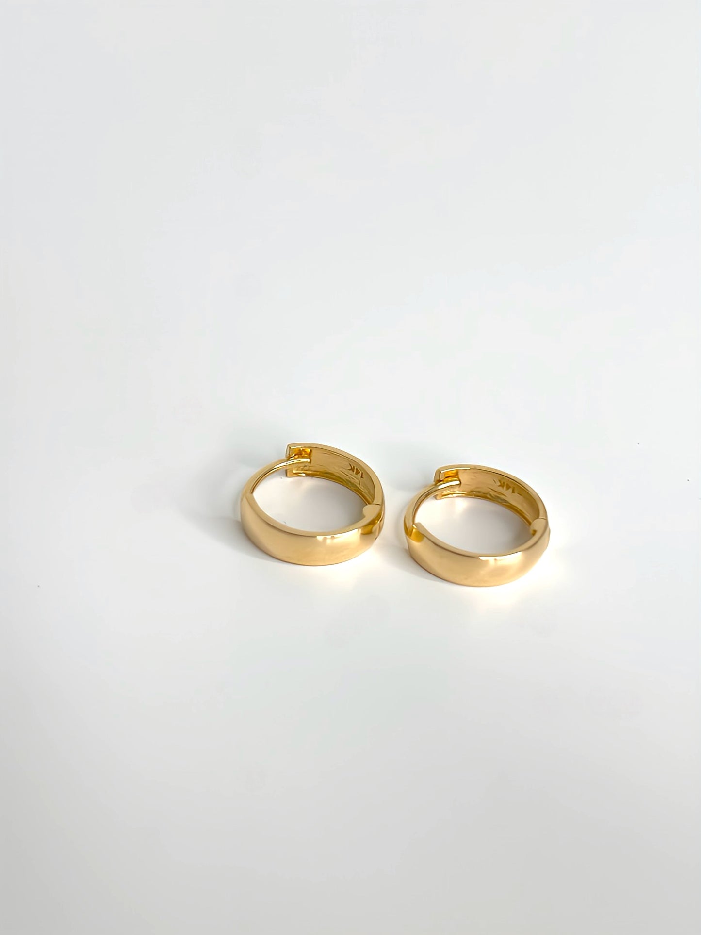Polished huggie hoop earrings