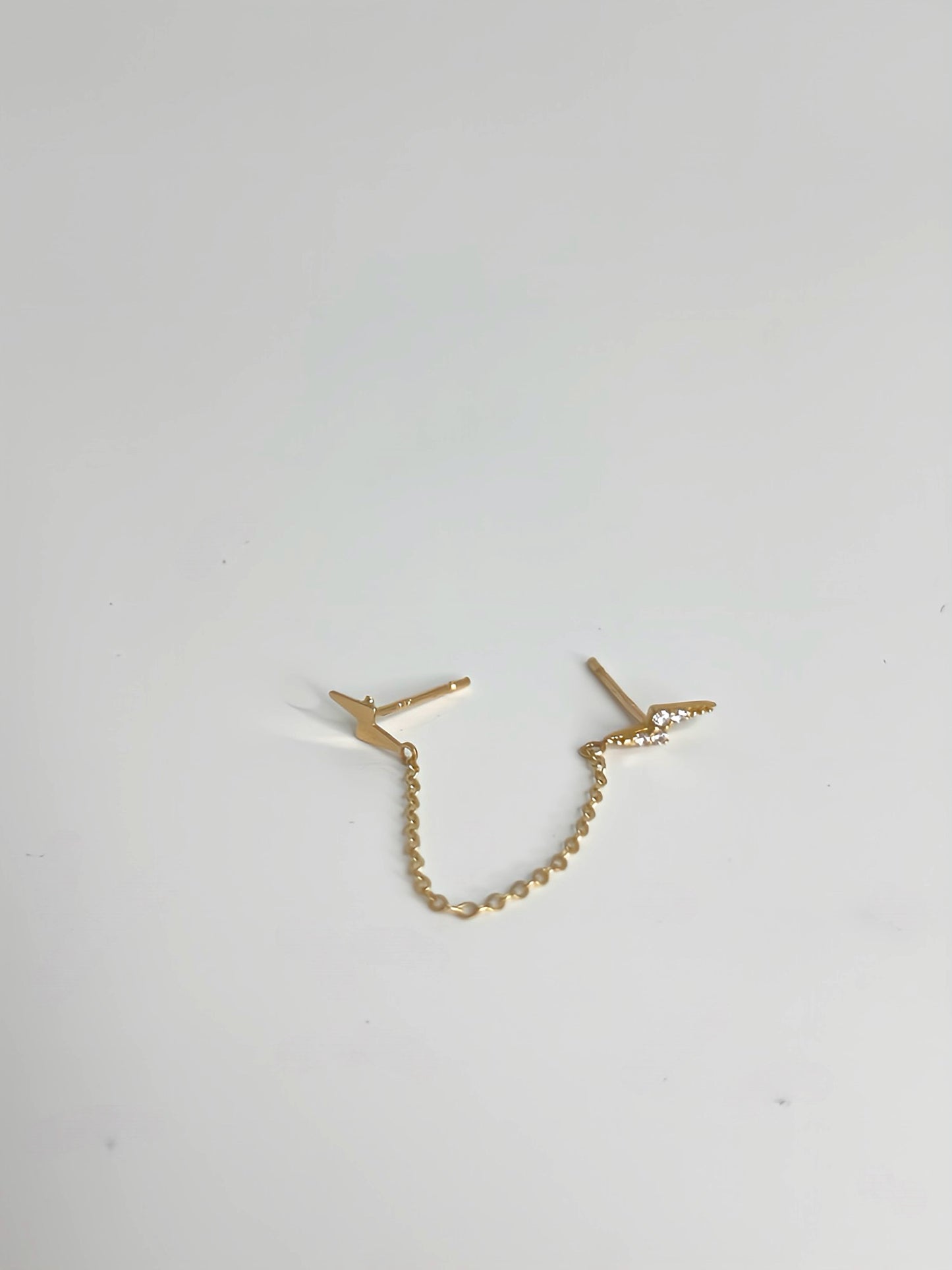 Zirconia lighting mismatch drop stud earrings