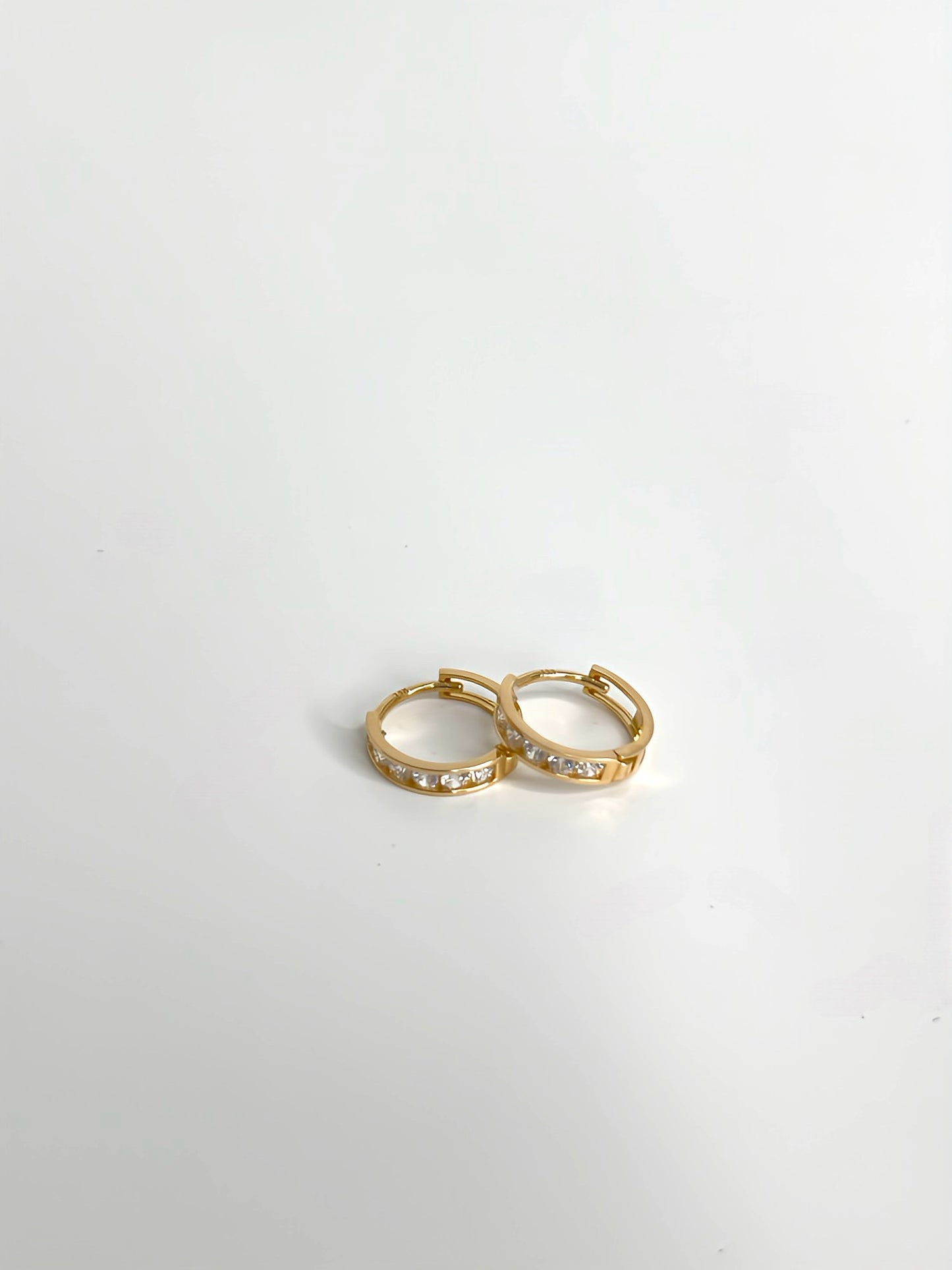 Zirconia huggie hoop earrings