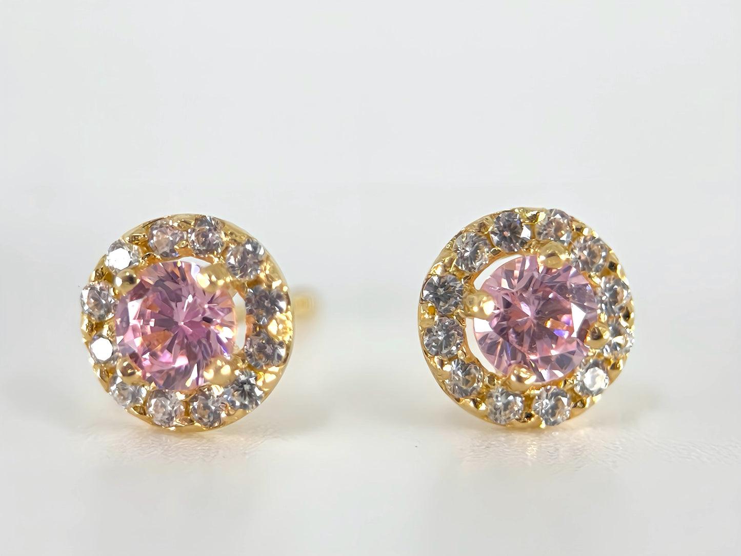 Round pink and white cubic zirconia stud earrings