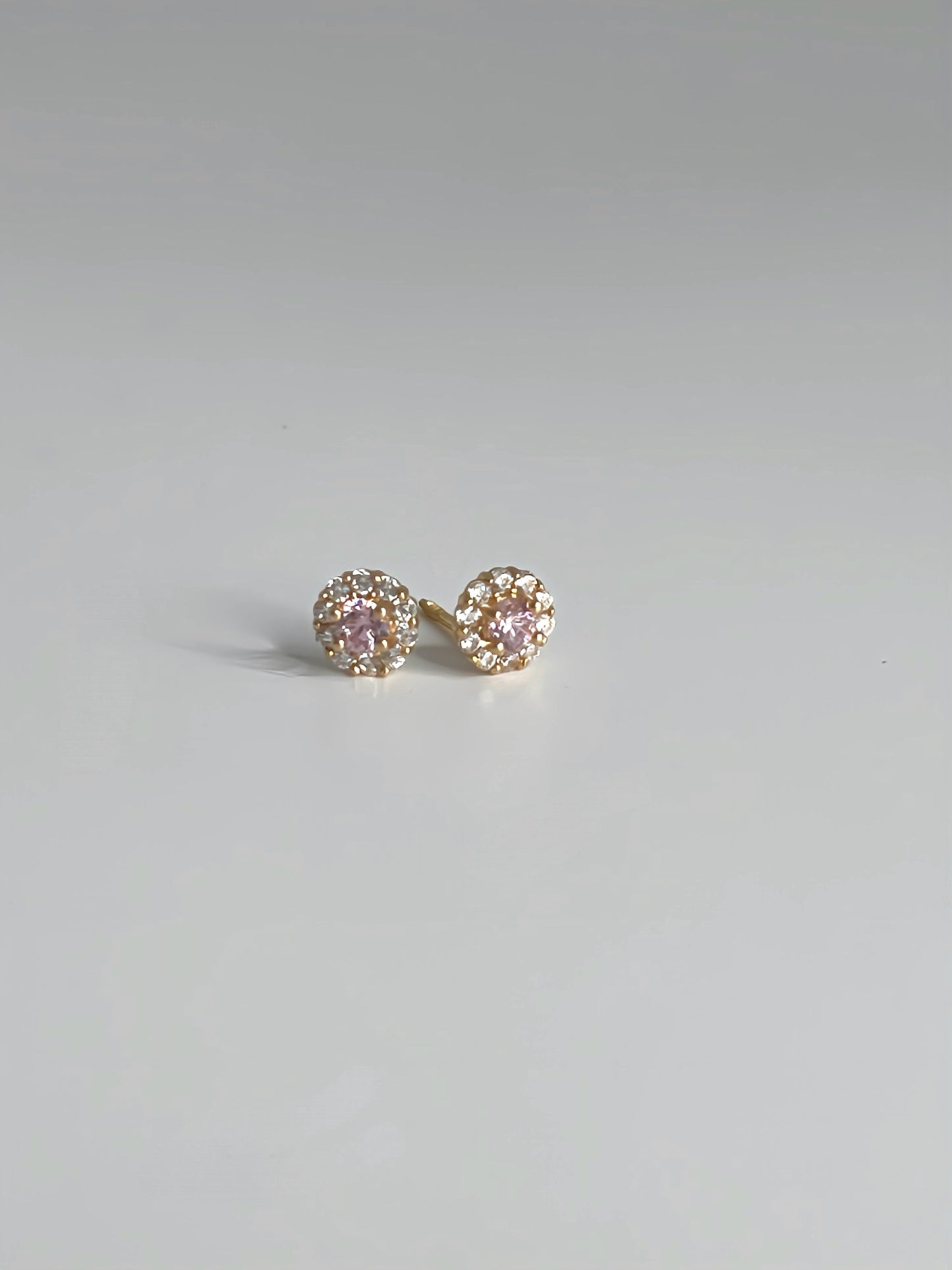 Round pink and white cubic zirconia stud earrings