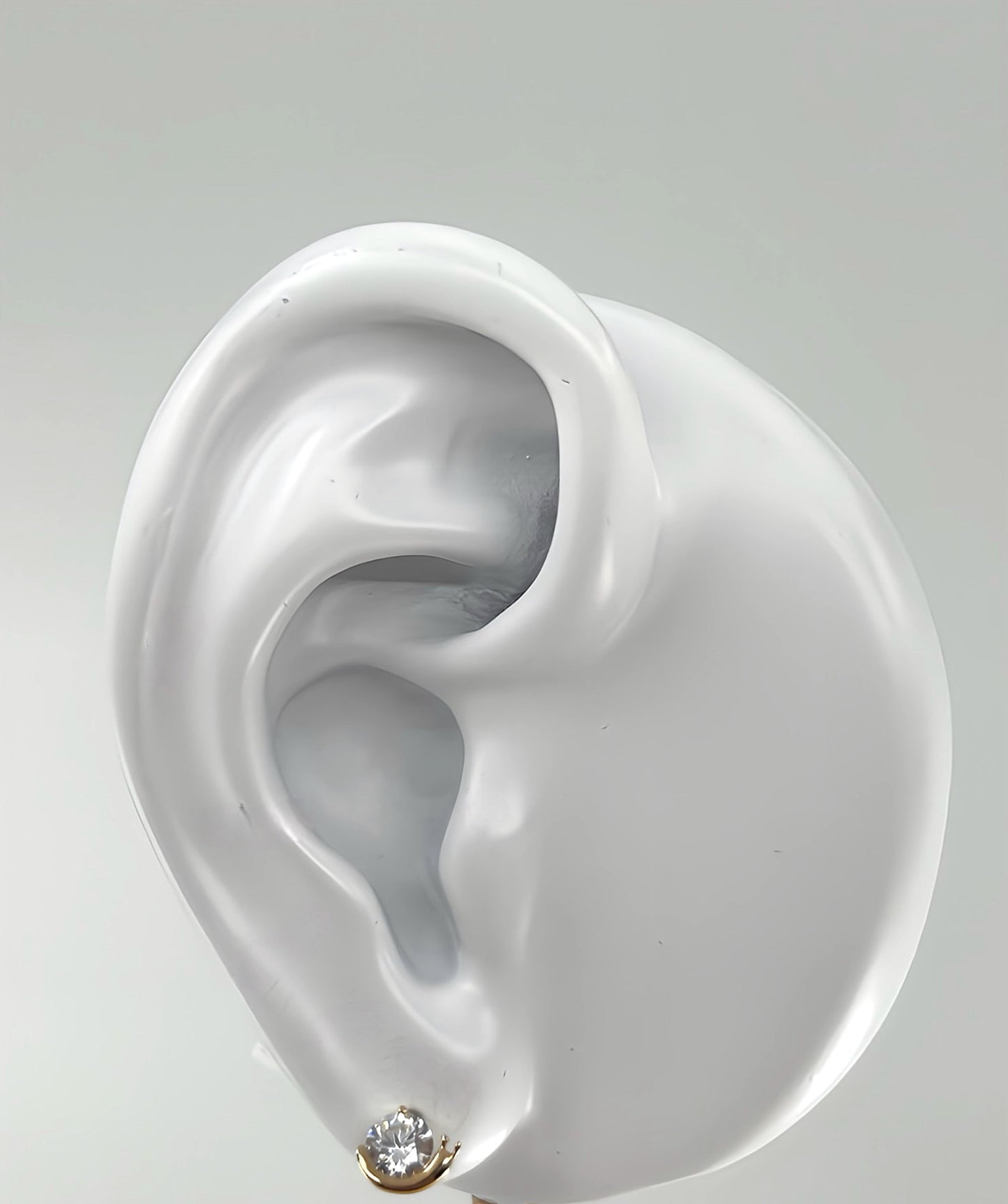 Zirconia snail stud earrings